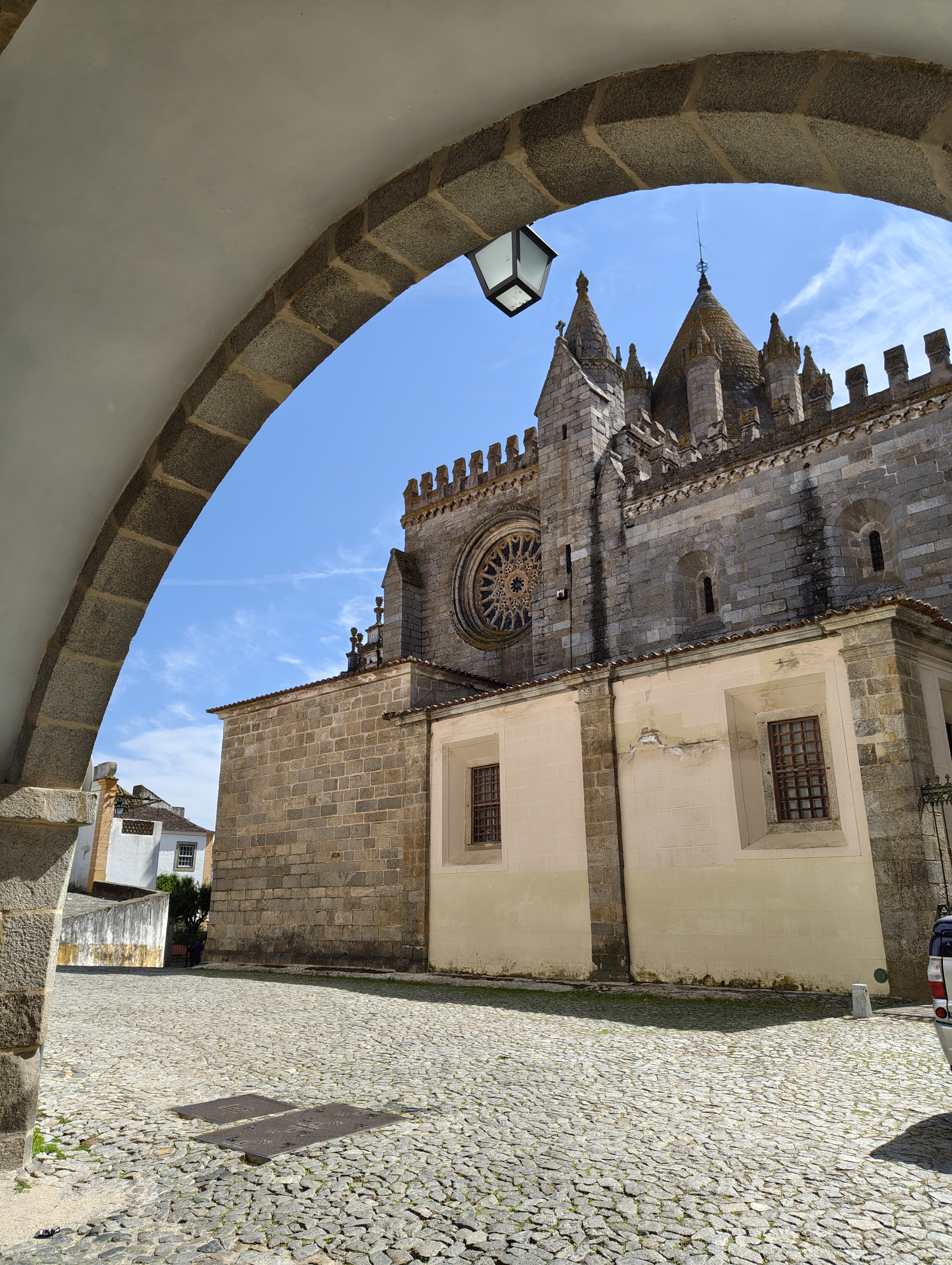 Évora Cathedral framed by a stone arch